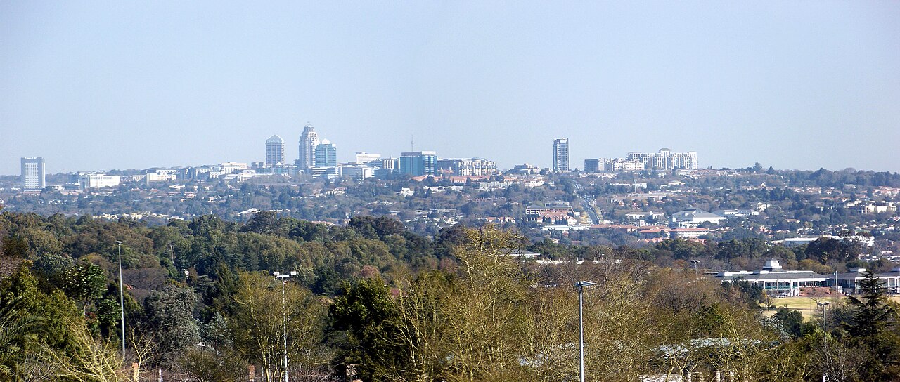 Sandton skyline in Johannesburg viewed across the city at dusk
