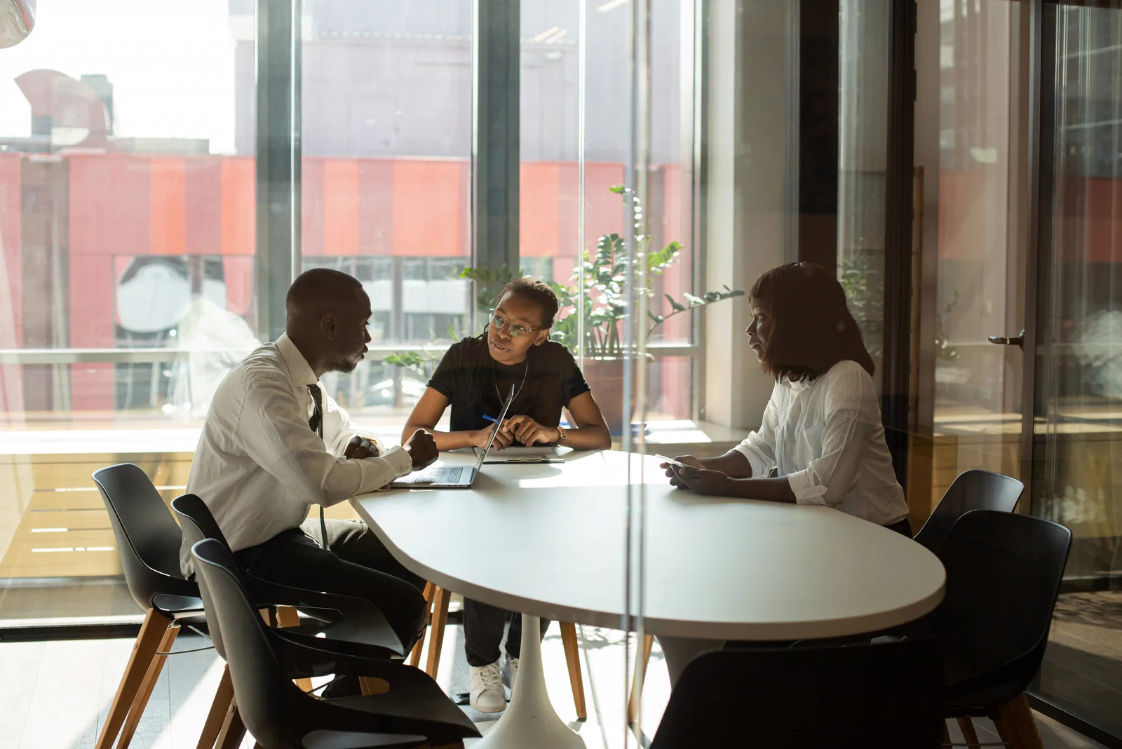Colleagues discussing a business transformation plan